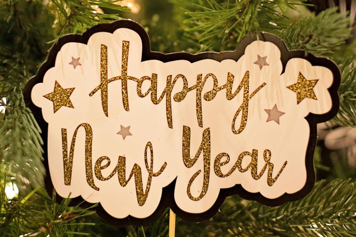 Close-up of a beautiful New Year sign with festive Christmas decorations.